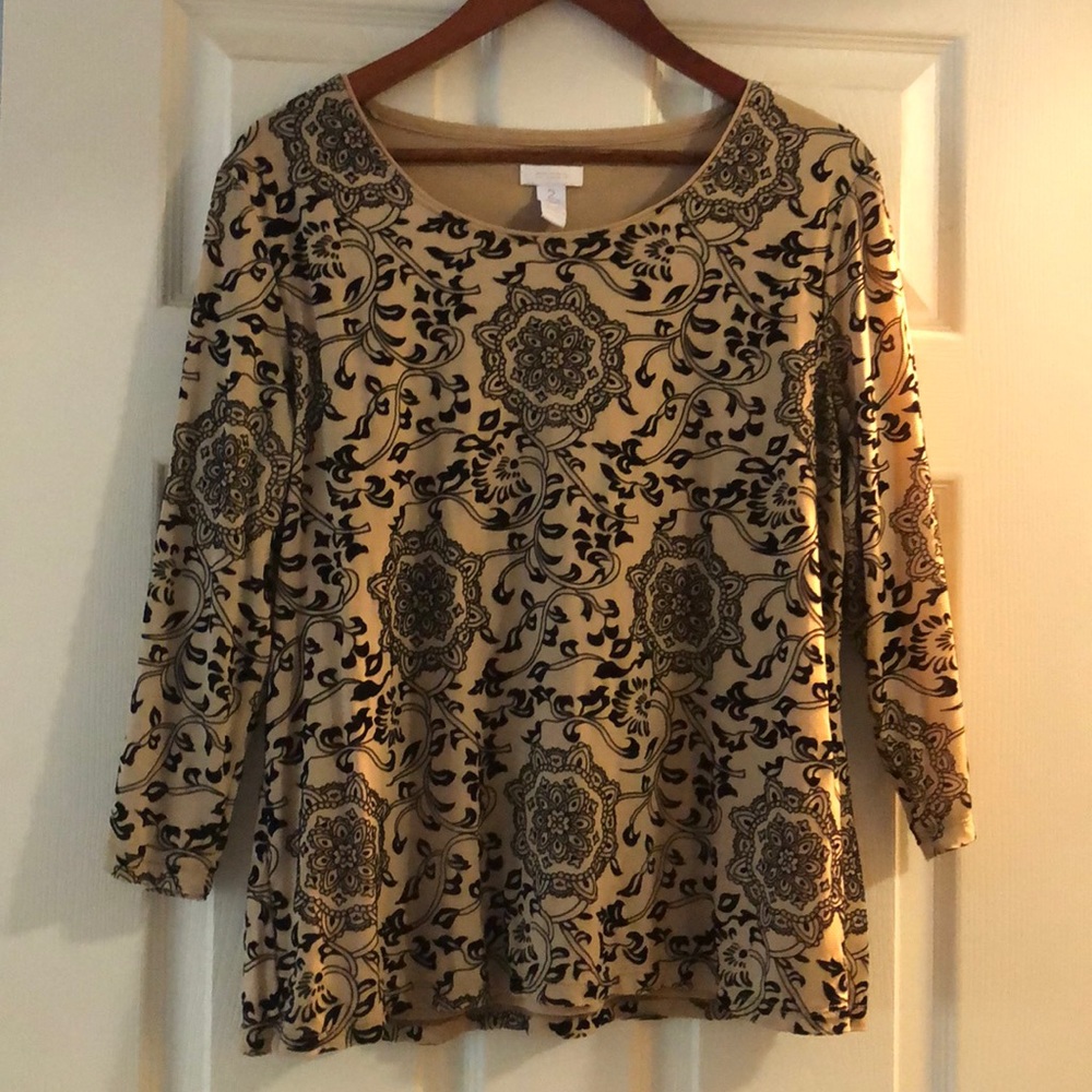 Chico’s three quarter sleeve dress blouse.